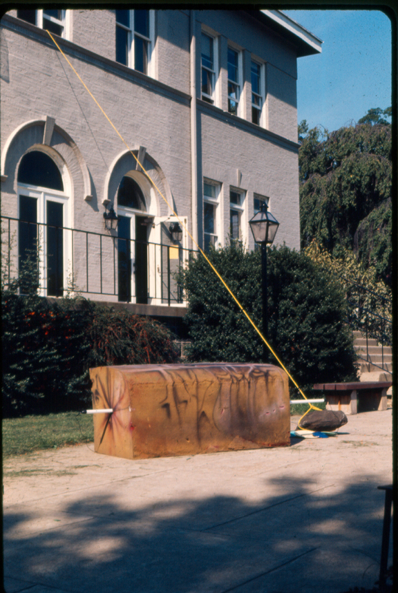 A site specific piece from Harry Andersons 1980 exhibit at Swathmore College created from foam rubber, rope, a rock, a florescent tube and fiesta ware 